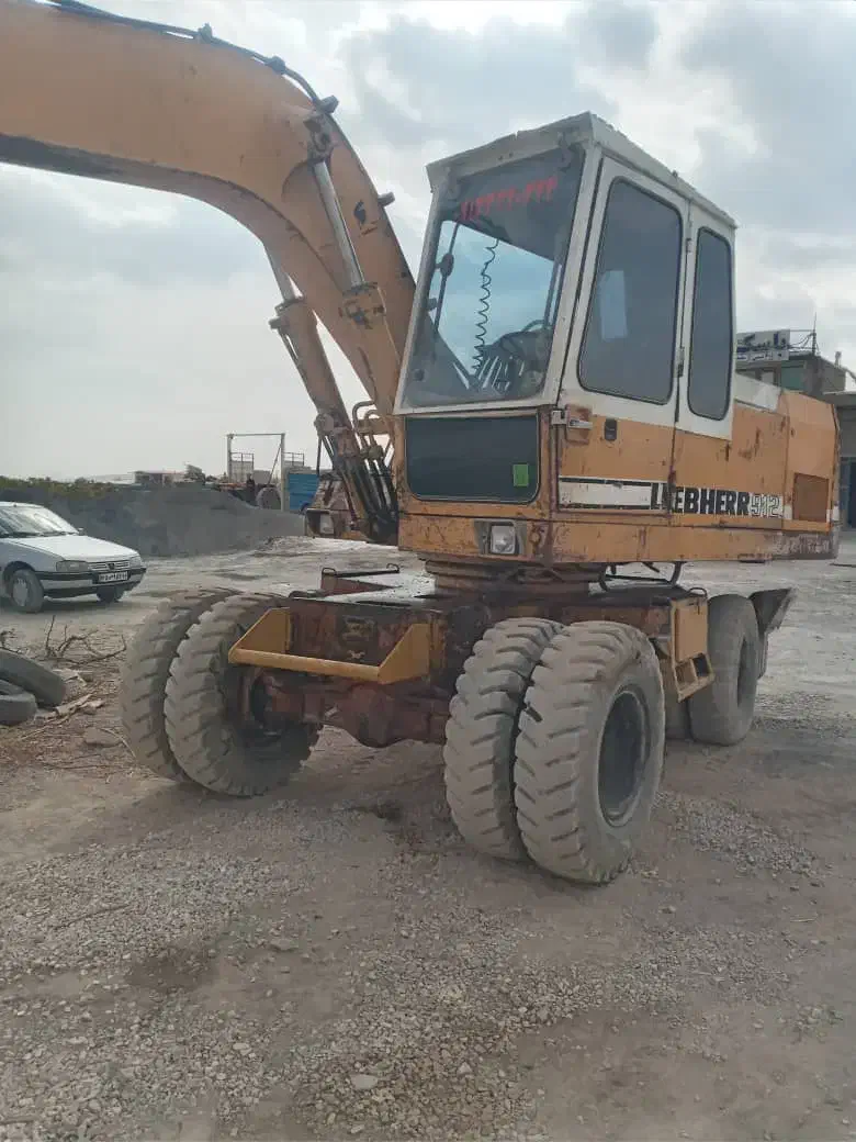 بیل مکانیکی چرخ لاستیکی|خودرو سنگین|تیران, |دیوار