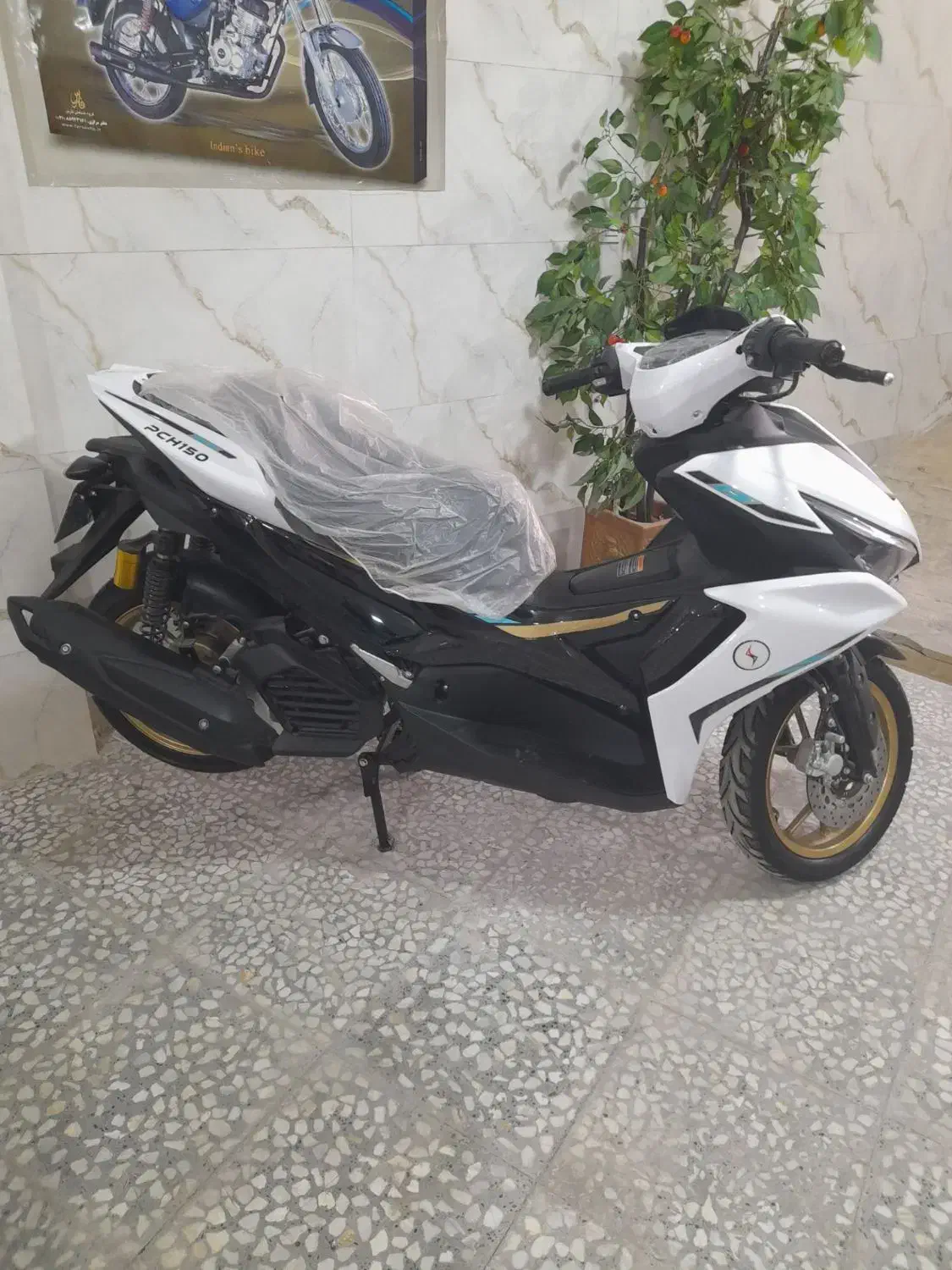 موتور کلیک|موتورسیکلت|اندیشه, اندیشه فاز ۱|دیوار