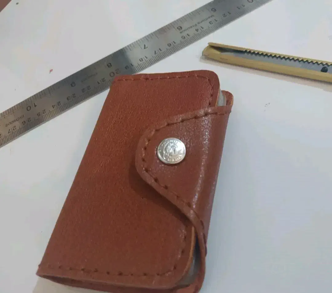 یک عدد کیف مدارک گمشده|اشیا|لاهیجان, کوی زمانی|دیوار