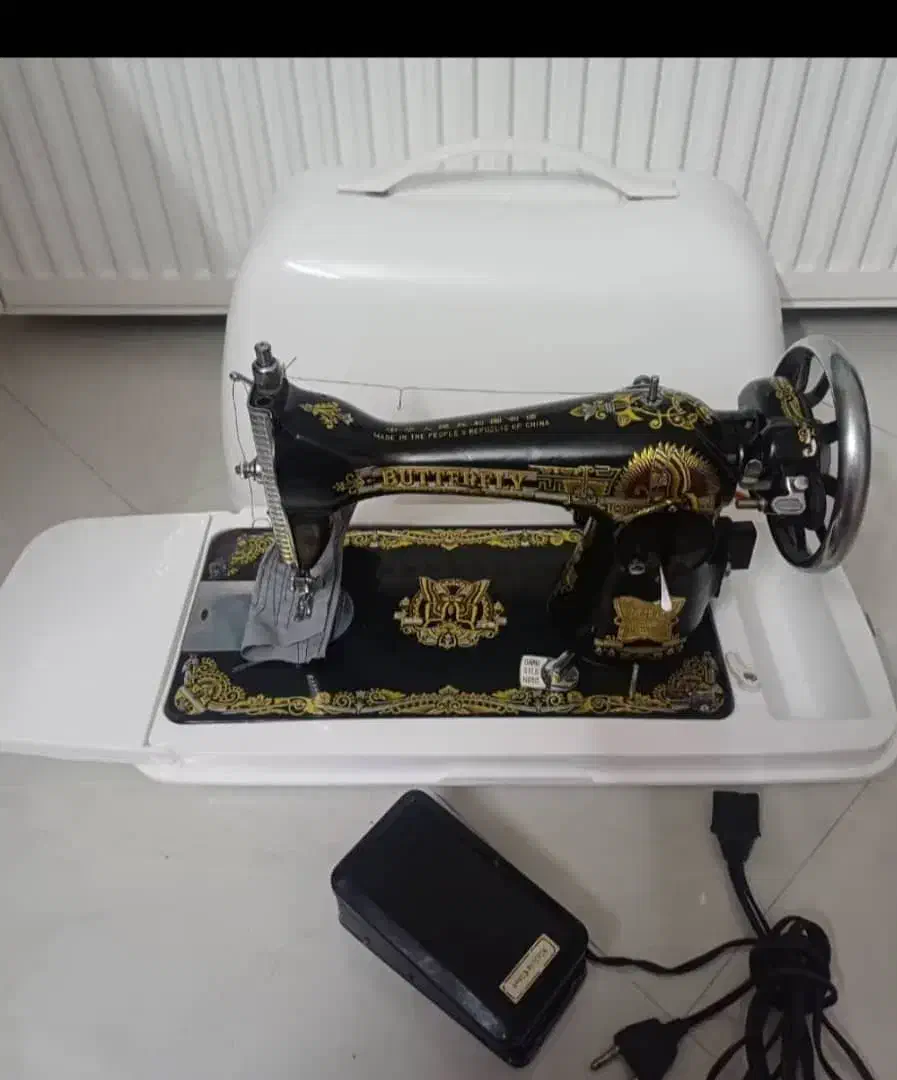 خیاط|چرخ خیاطی و ریسندگی|مهرستان, |دیوار