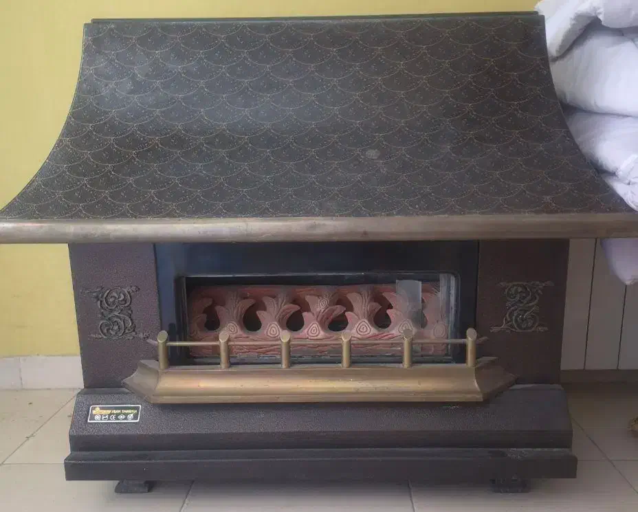 بخاری طرح شومینه درحد نو|بخاری، هیتر، شومینه|گلبهار, شهر جدید گلبهار|دیوار