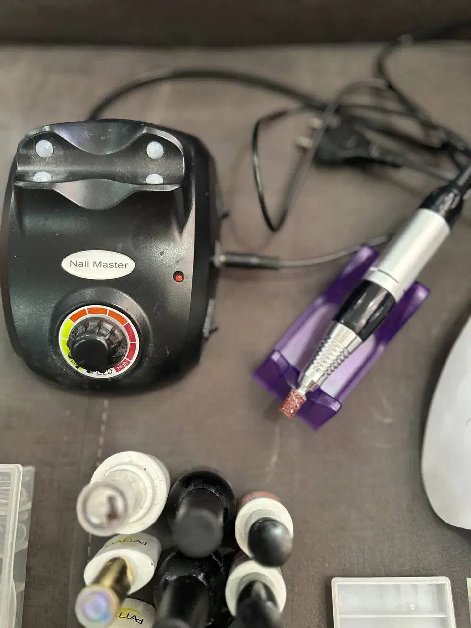 لوازم کاشت ناخن دستگاه یووی سوهان برقی تقریبا نو|آرایشی، بهداشتی، درمانی|رشت, منظریه|دیوار