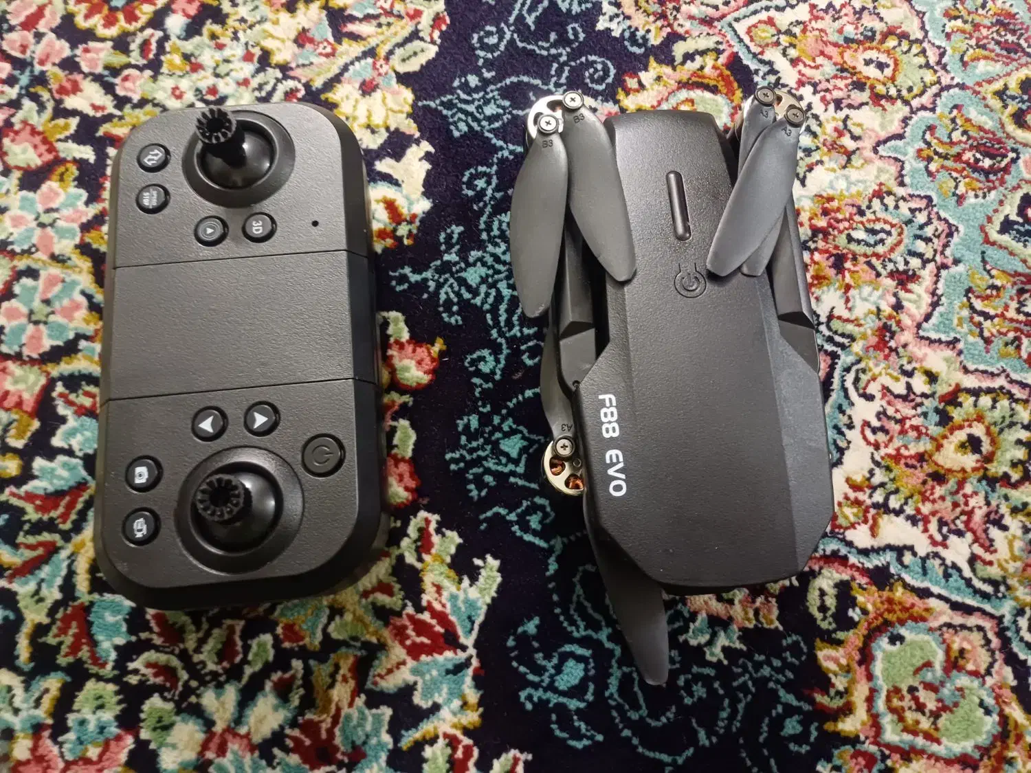 پهپاد مشکی|دوربین عکاسی و فیلم‌برداری|گلبهار, شهر جدید گلبهار|دیوار