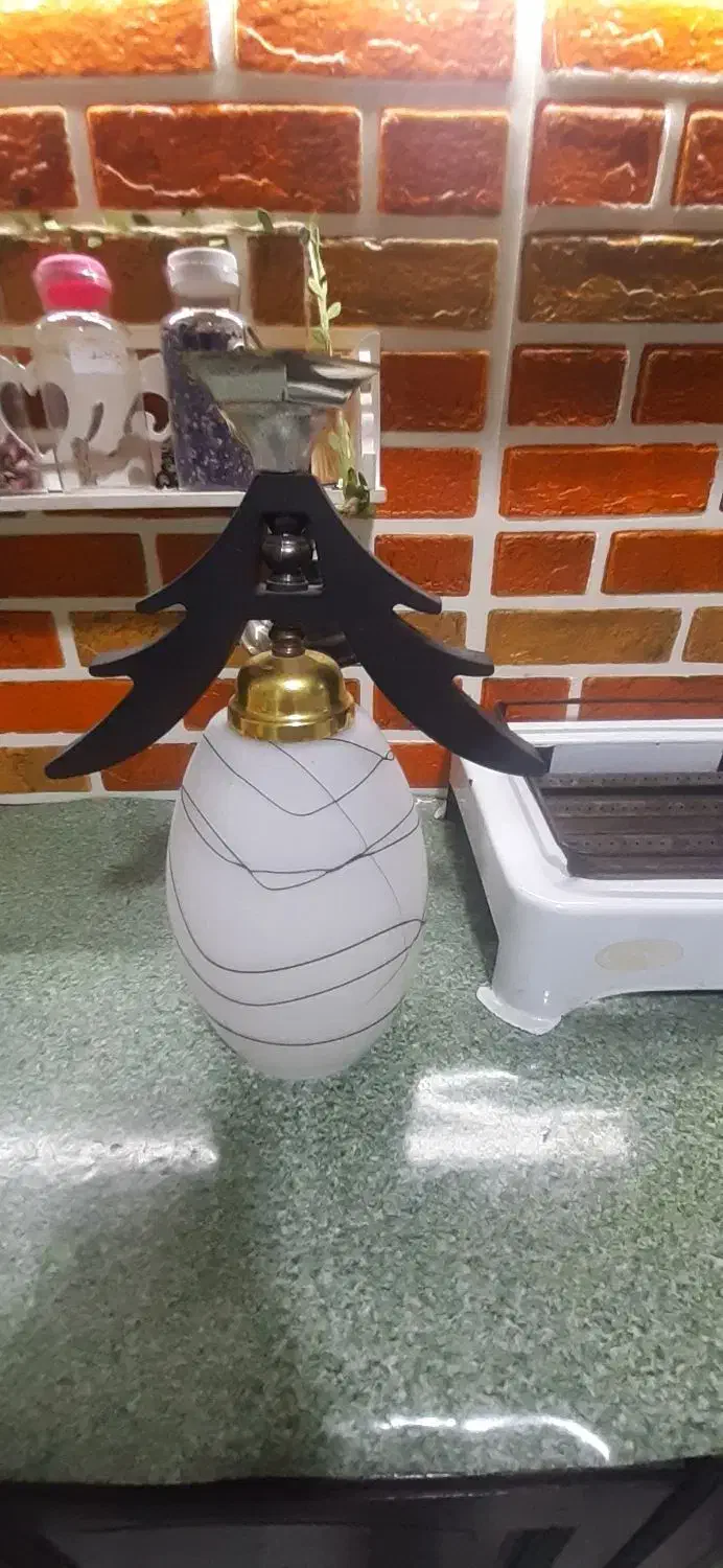 لوستر تک شاخه نو|لوستر و چراغ آویز|تهران, فلسطین (میدان انقلاب)|دیوار