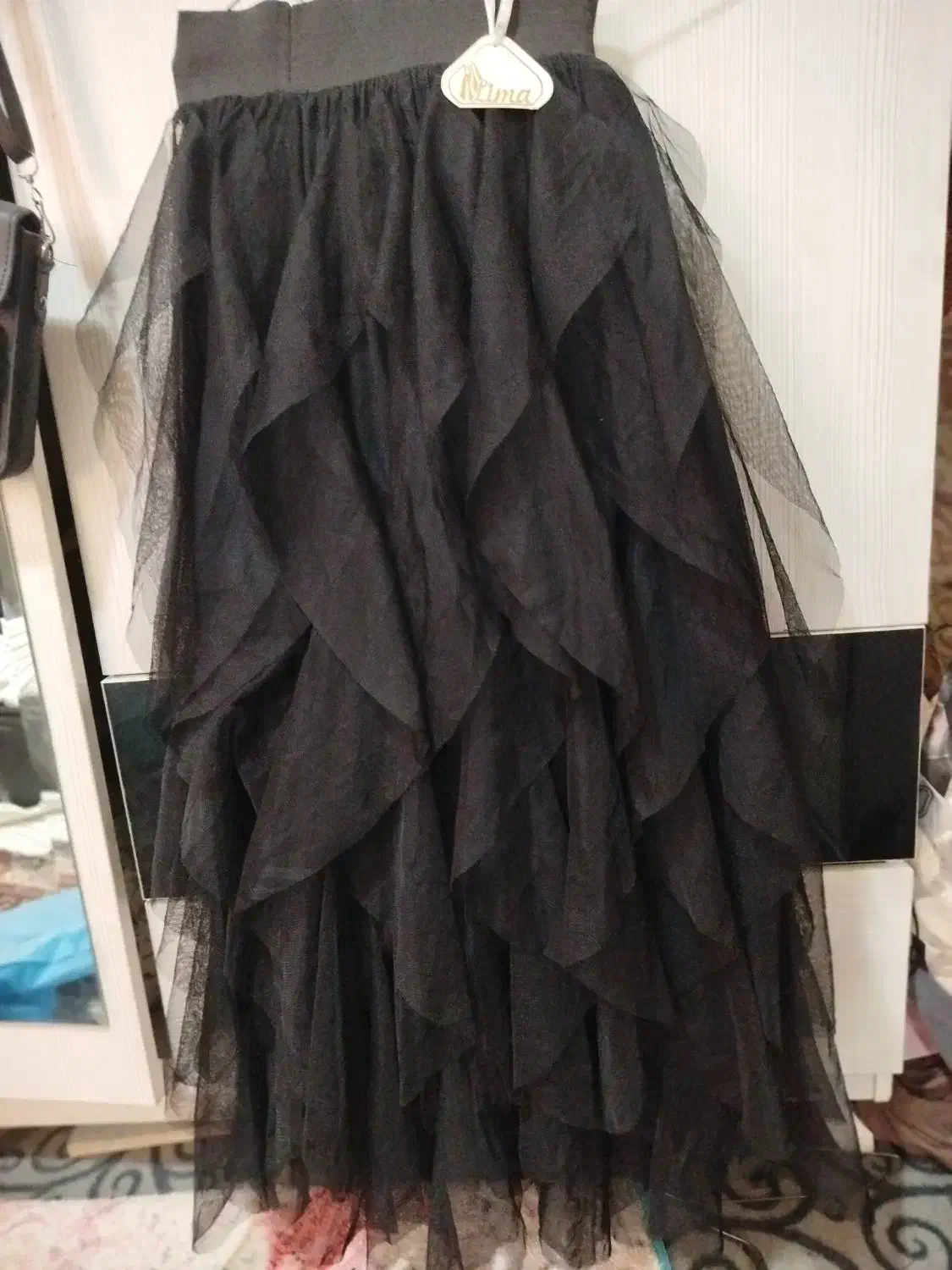 دامن مجلسی|لباس|رباط‌کریم, رباط‌کریم|دیوار