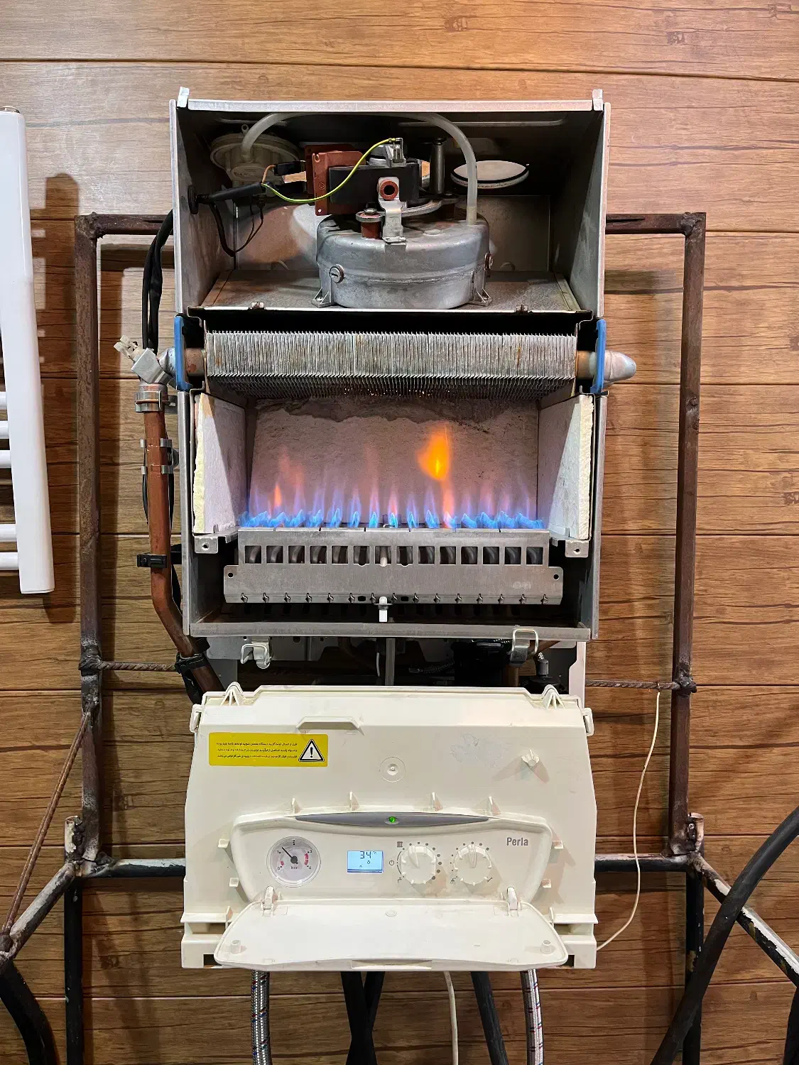 تعمیرات تخصصی پکیج دیواری و رادیاتور|خدمات پیشه و مهارت|بابلسر, |دیوار