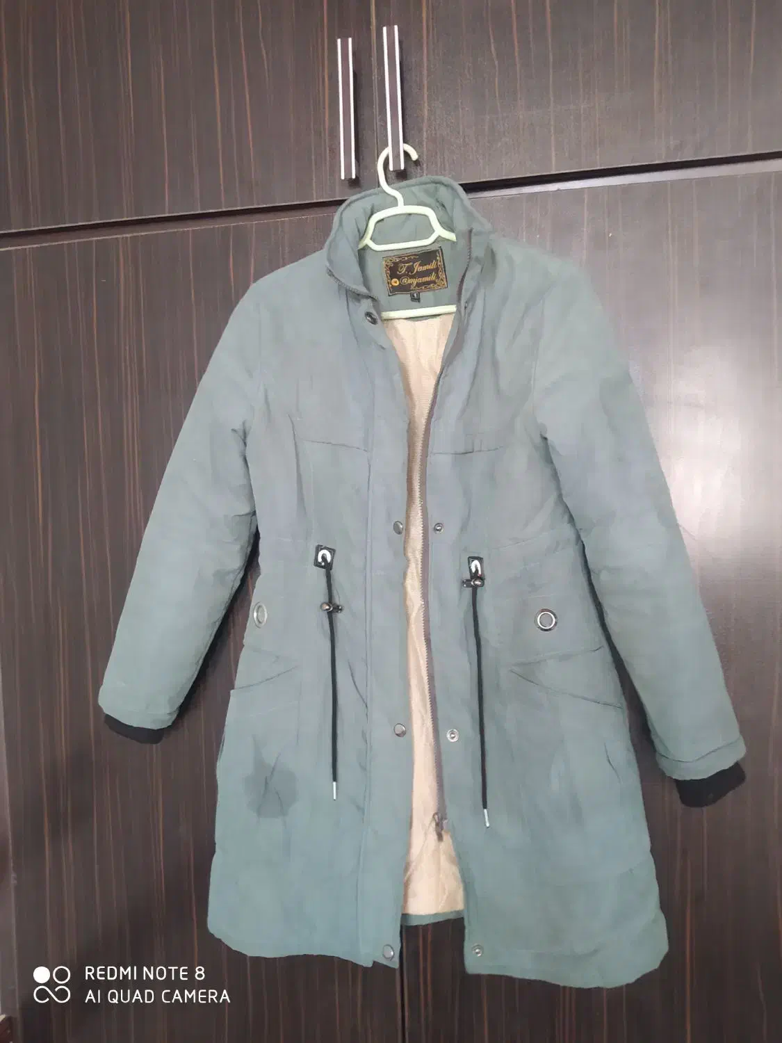 کاپشن|لباس|فردوس (خراسان), |دیوار