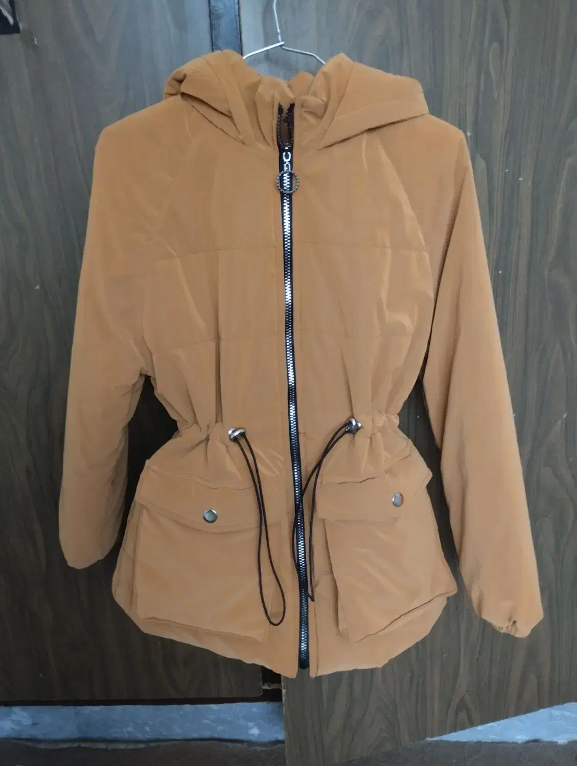 کاپشن سیلیکونی نونو آک|لباس|مهاجران, |دیوار