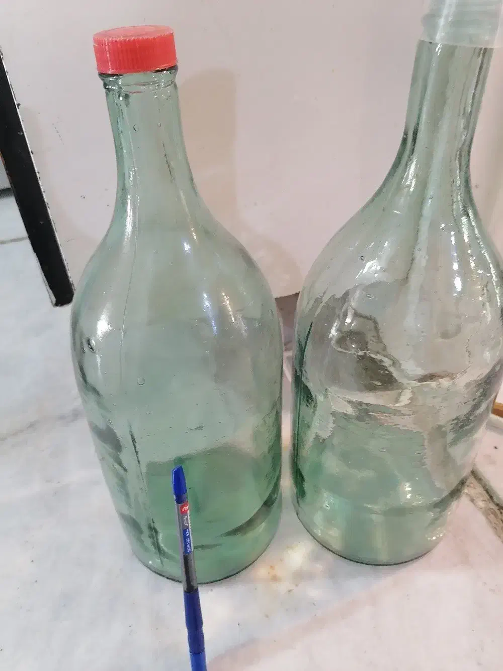 بطری نیزه ای آبی رنگ آبلیمو آبغوره|ظروف نگهدارنده، پلاستیکی، یک‌بارمصرف|اهواز, نادری|دیوار