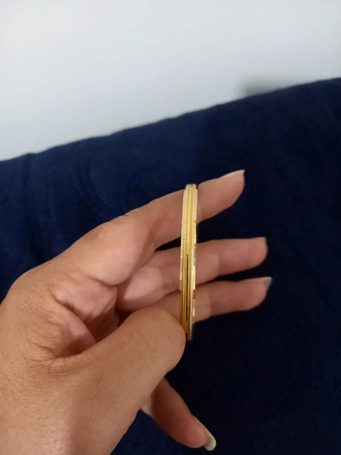 النگوی طلا|جواهرات|بومهن, |دیوار