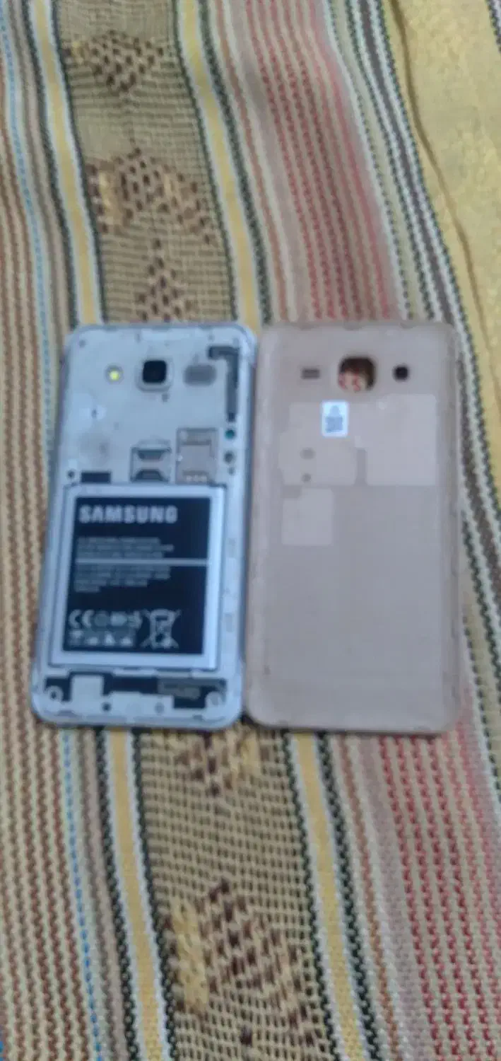 گوشی‌جی5|موبایل|قم, نیروگاه|دیوار