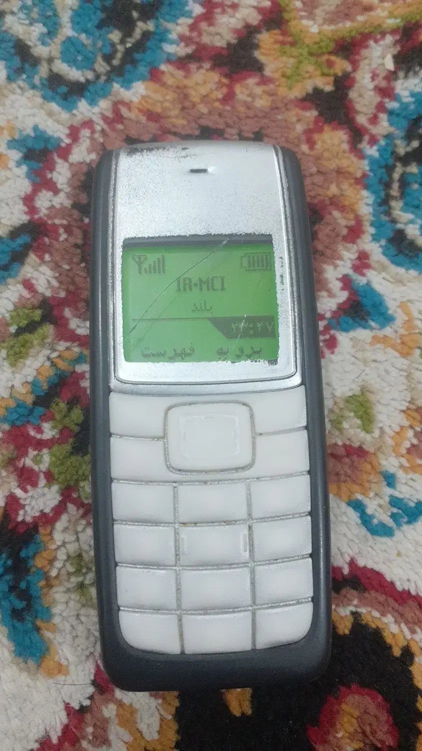 گوشی ساده نوکیااصل|موبایل|آبپخش, |دیوار