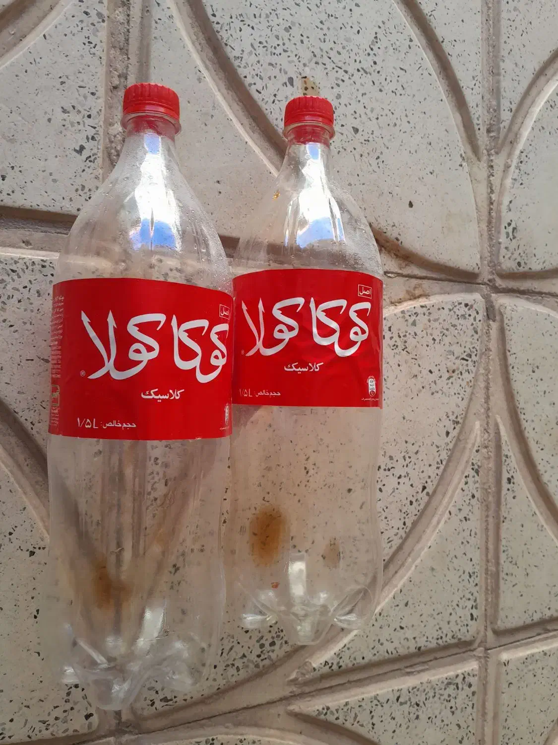 بطری یک ونیم لیتری نوشابه....|ظروف نگهدارنده، پلاستیکی، یکبارمصرف|بیرجند, |دیوار