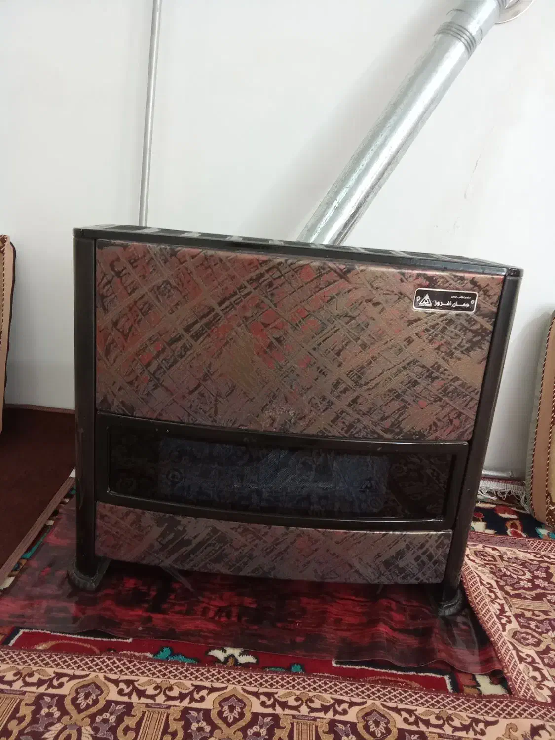 بخاری جهان افروز|بخاری، هیتر، شومینه|اهر, |دیوار