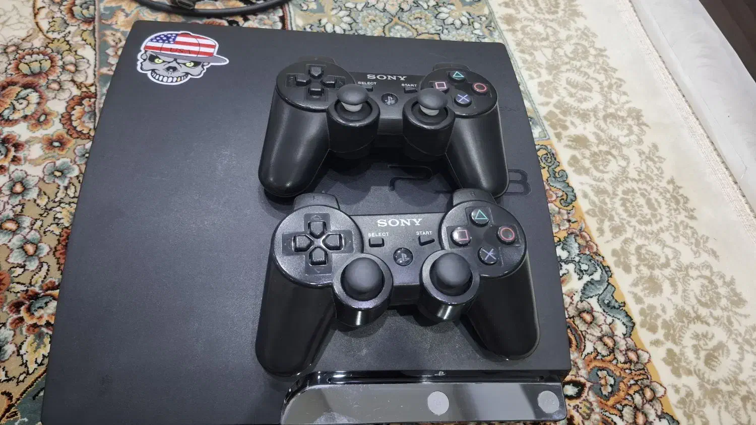 PS3 اسلیم با همراه دو دسته|کنسول، بازی ویدئویی و آنلاین|گنبد کاووس, |دیوار
