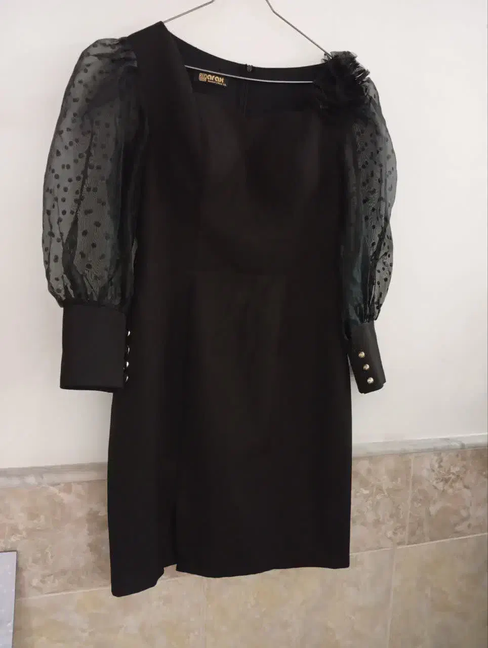 لباس در حد|لباس|قم, قلعه کامکار|دیوار