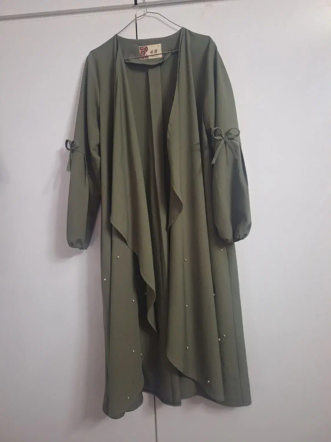 کاپشن و مانتو|لباس|تربت‌حیدریه, مسجد جامع|دیوار