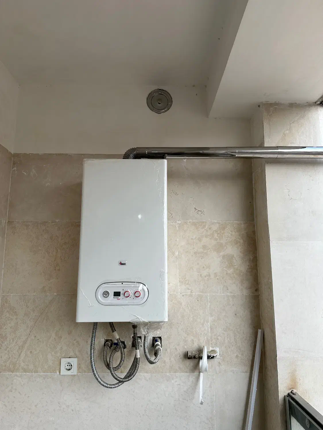 تعمیر و سرویس انواع پکیج و ابگرمکن‌|آبگرمکن، پکیج، شوفاژ|بجنورد, |دیوار