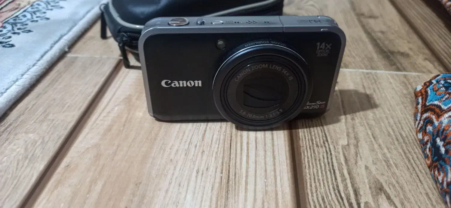 دوربین کنان|دوربین عکاسی و فیلمبرداری|قم, باغ شریفی|دیوار