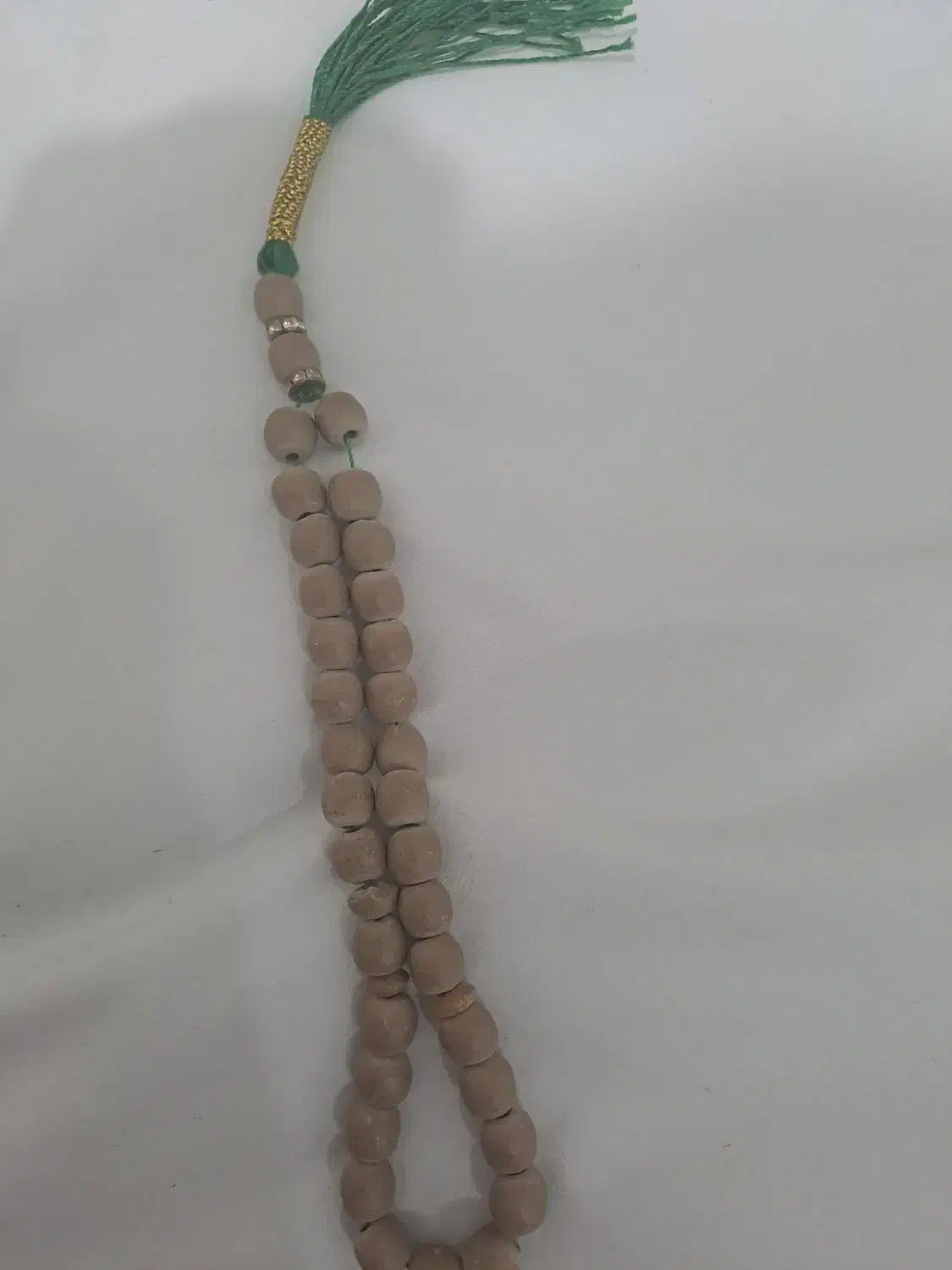 تسبیح تربت کربلا|کلکسیون اشیاء عتیقه|مسجد سلیمان, |دیوار