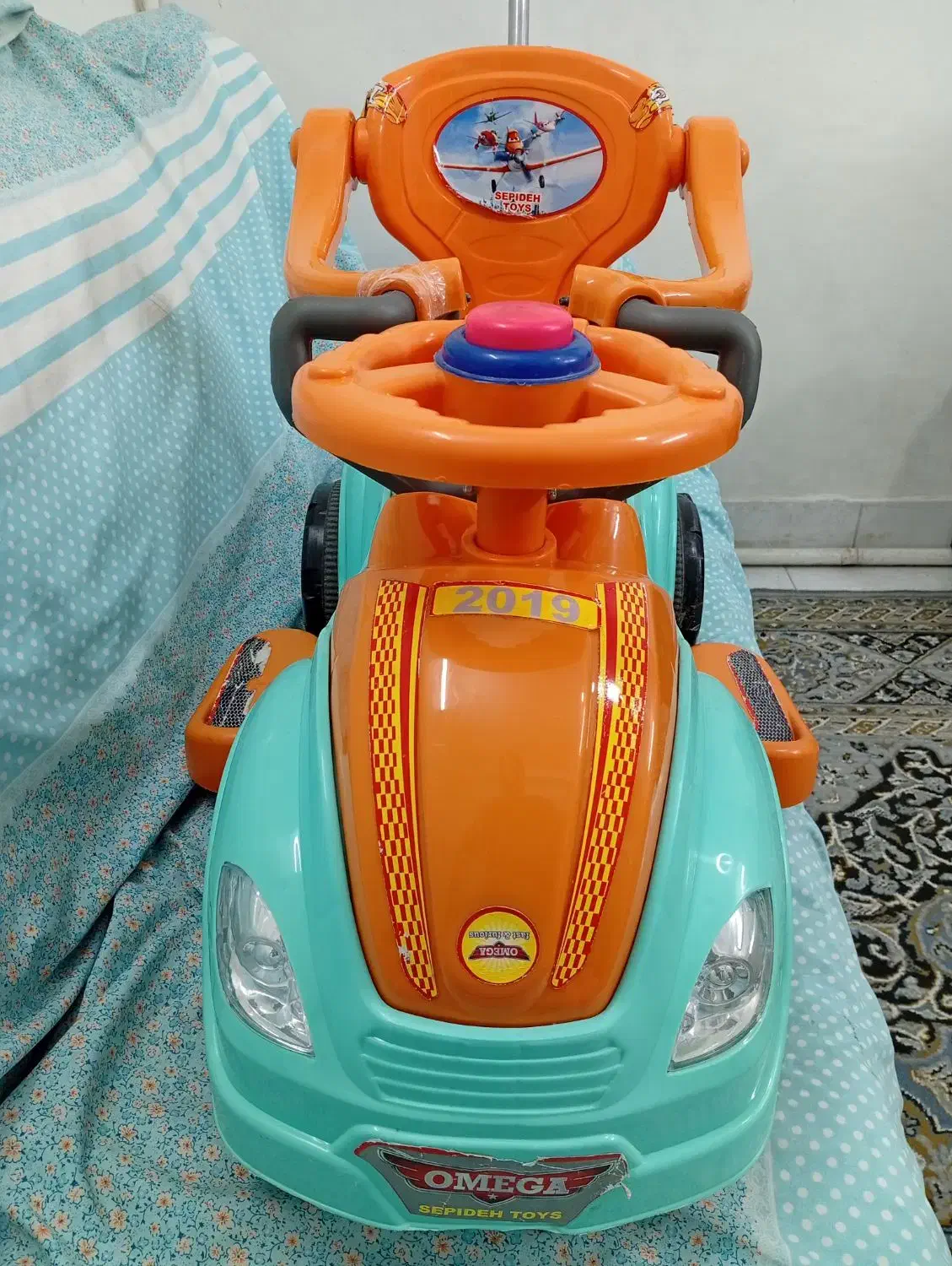 ماشین کودک|اسباببازی بچه|ری, شهادت|دیوار