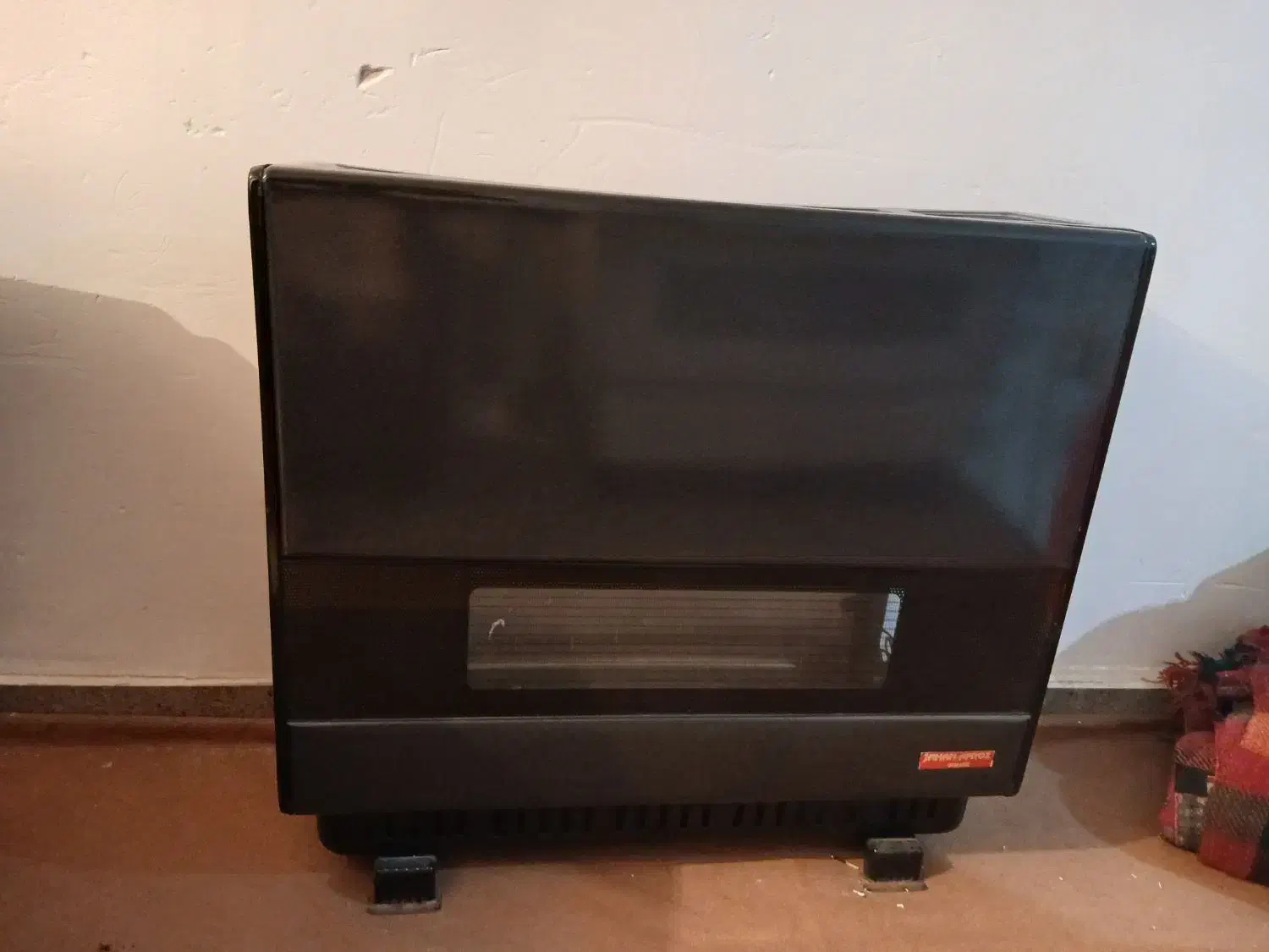 بخاری جهان افروز|بخاری، هیتر، شومینه|بیجار, |دیوار