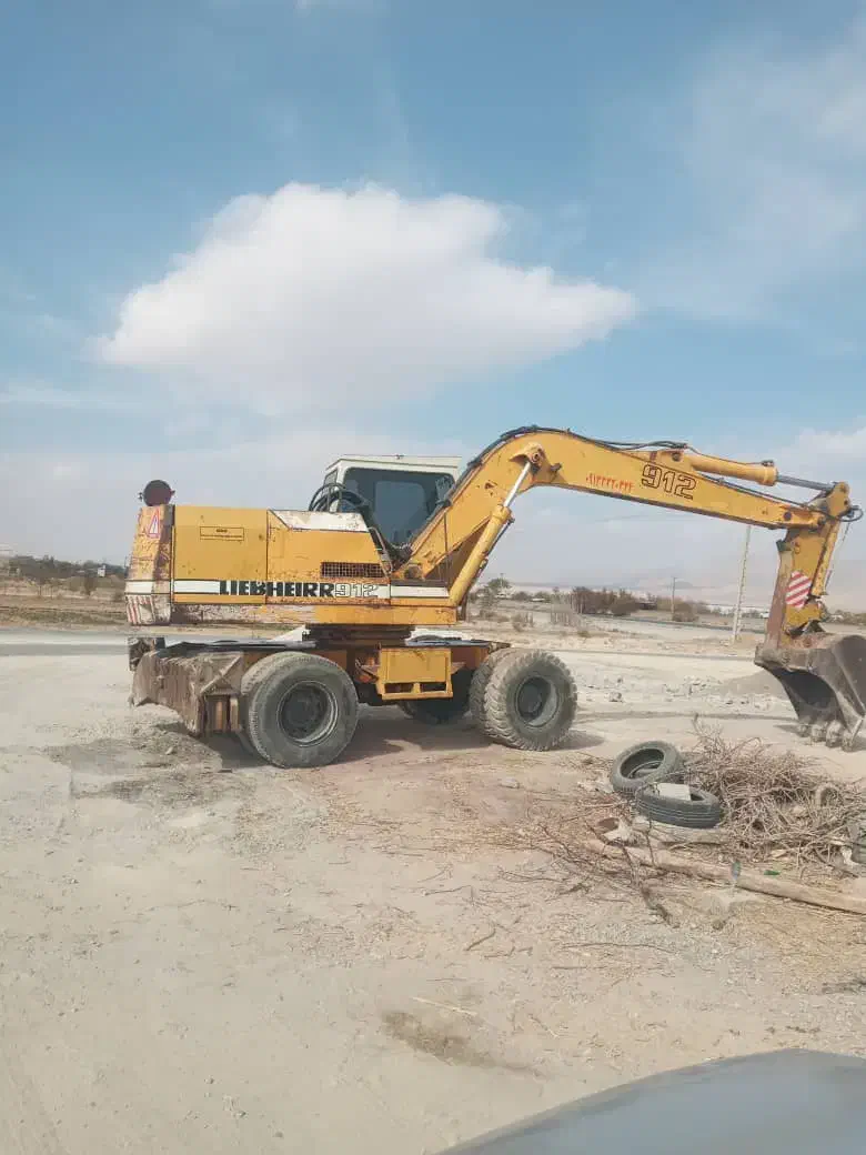 بیل مکانیکی چرخ لاستیکی|خودرو سنگین|تیران, |دیوار