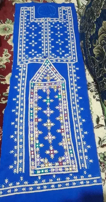 دوخت لباس تپه ای|لباس|کهنوج, |دیوار