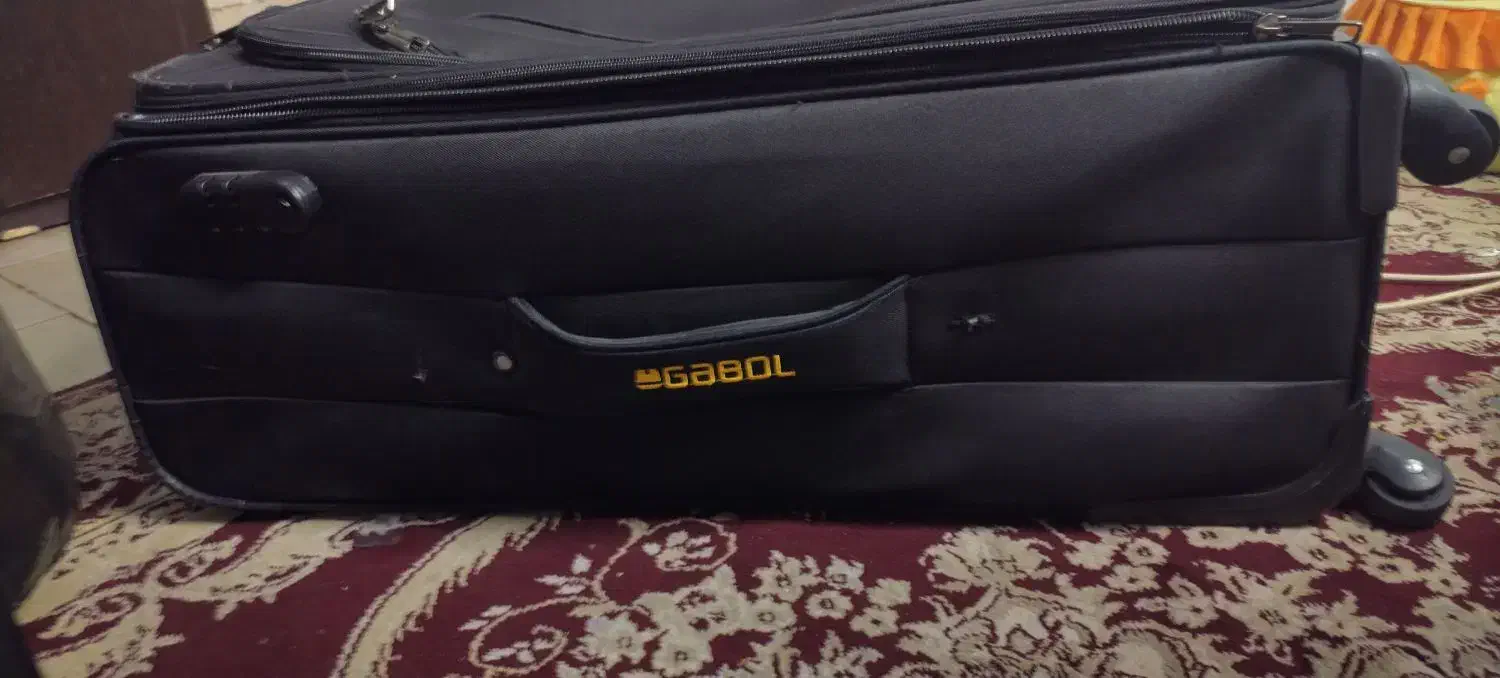 چمدون نو|کیف، کفش، کمربند|نیشابور, فضل|دیوار