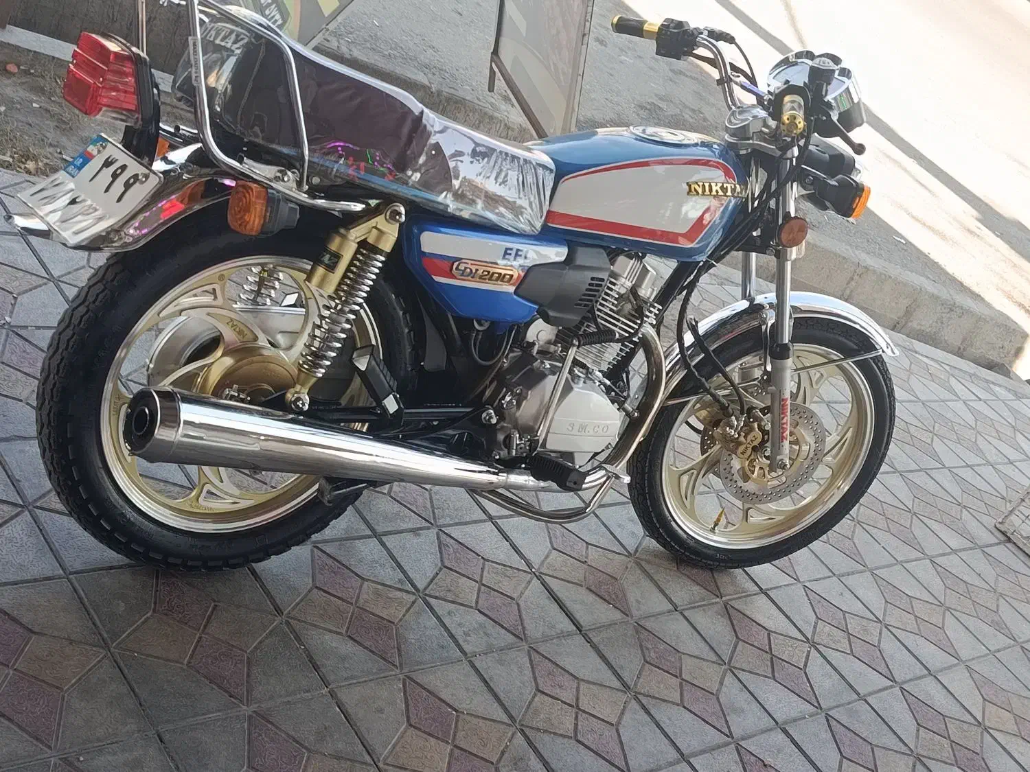 نیکتاز پلاس|موتورسیکلت|شاهین دژ, |دیوار