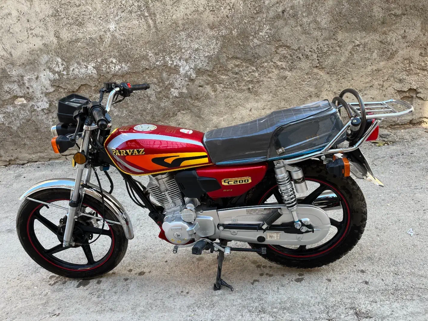 200 پرواز|موتورسیکلت|بروجن, |دیوار