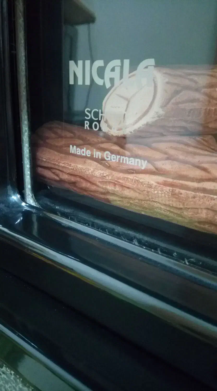 بخاری شومینه نیک کالا و تعدادی لوله بخاری نو|بخاری، هیتر، شومینه|برخوار, |دیوار