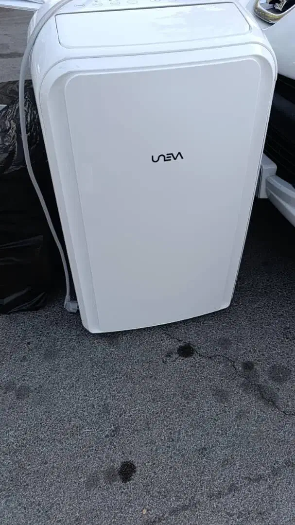 کولرگازی پرتابل یونیوا ۱۲ هزار سرد و گرم  قابل حمل|کولر گازی و فن‌کوئل|قم, امامزاده ابراهیم|دیوار