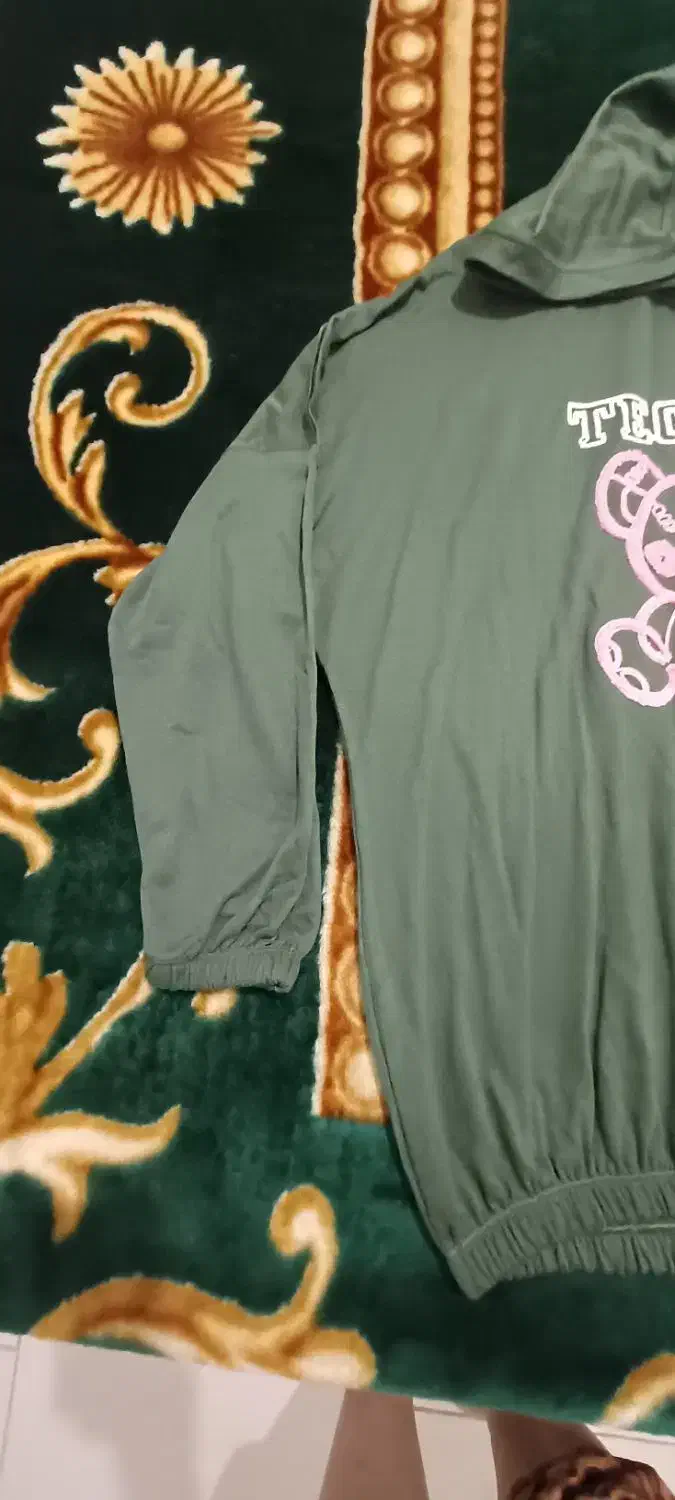 هودی کلاه دار|لباس|قدس, شهرقدس|دیوار