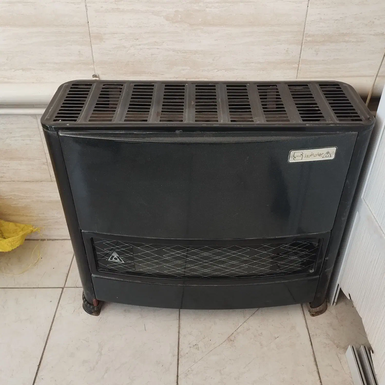 بخاری جهان افروز|بخاری، هیتر، شومینه|ملارد, |دیوار