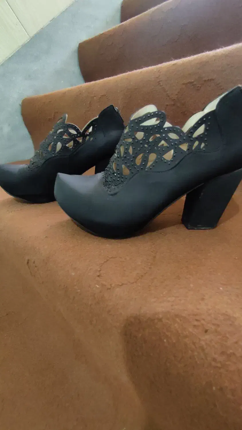 مجلسی|کیف، کفش، کمربند|قم, کلهری|دیوار