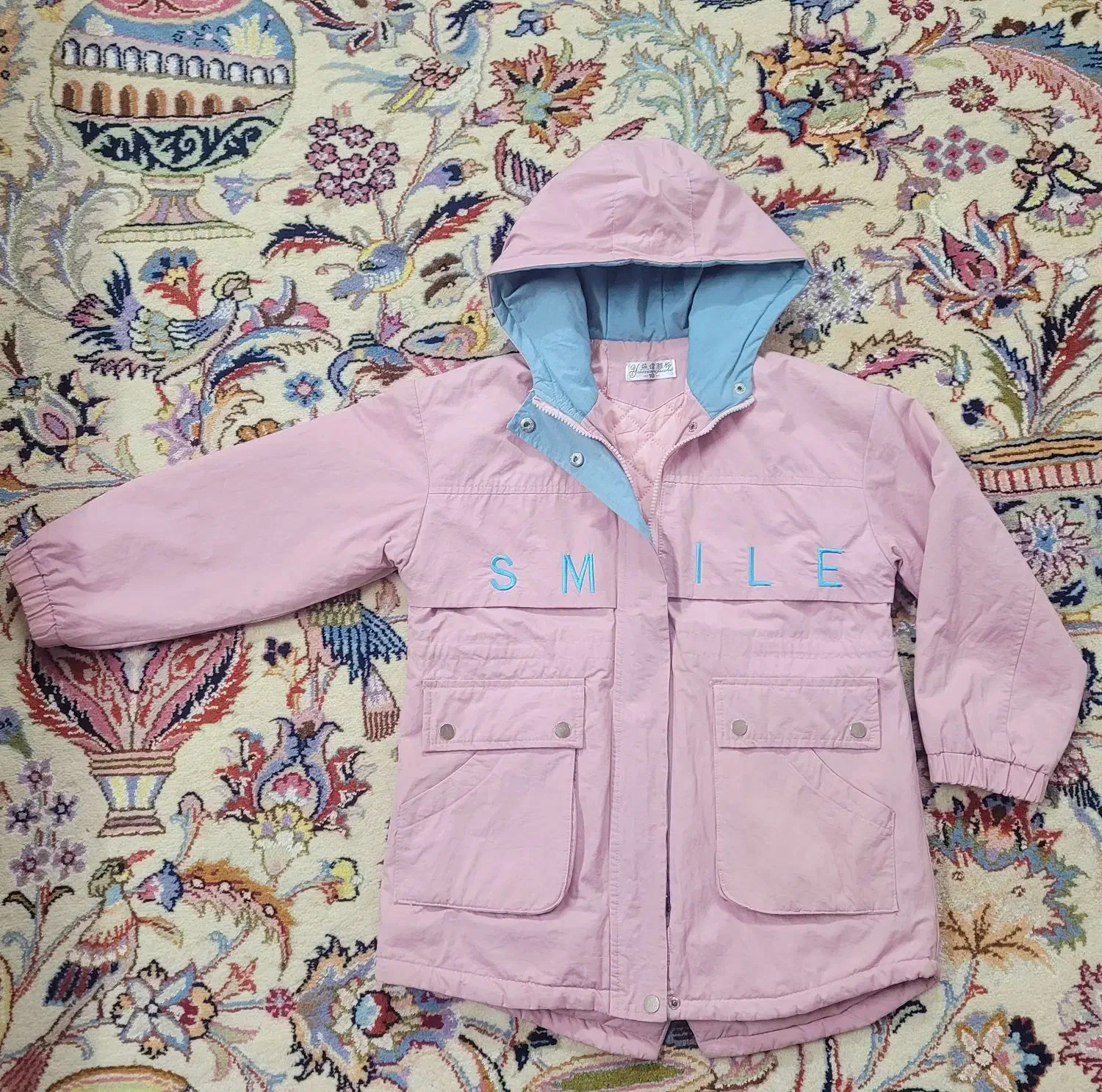 کاپشن خارجی|لباس|تربت‌حیدریه, باغ ملی|دیوار