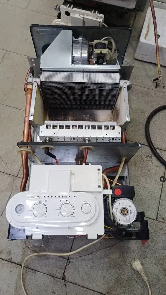 تعمیر پکیج وآبگرمکن وبخاری و لوله کشی وکاشیکاری|خدمات پیشه و مهارت|سهند, |دیوار