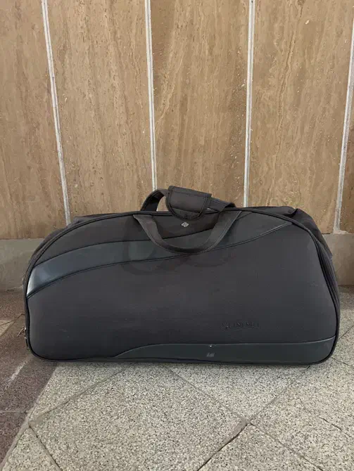 چمدون ایستاده|کیف، کفش، کمربند|مشهد, دانشجو|دیوار