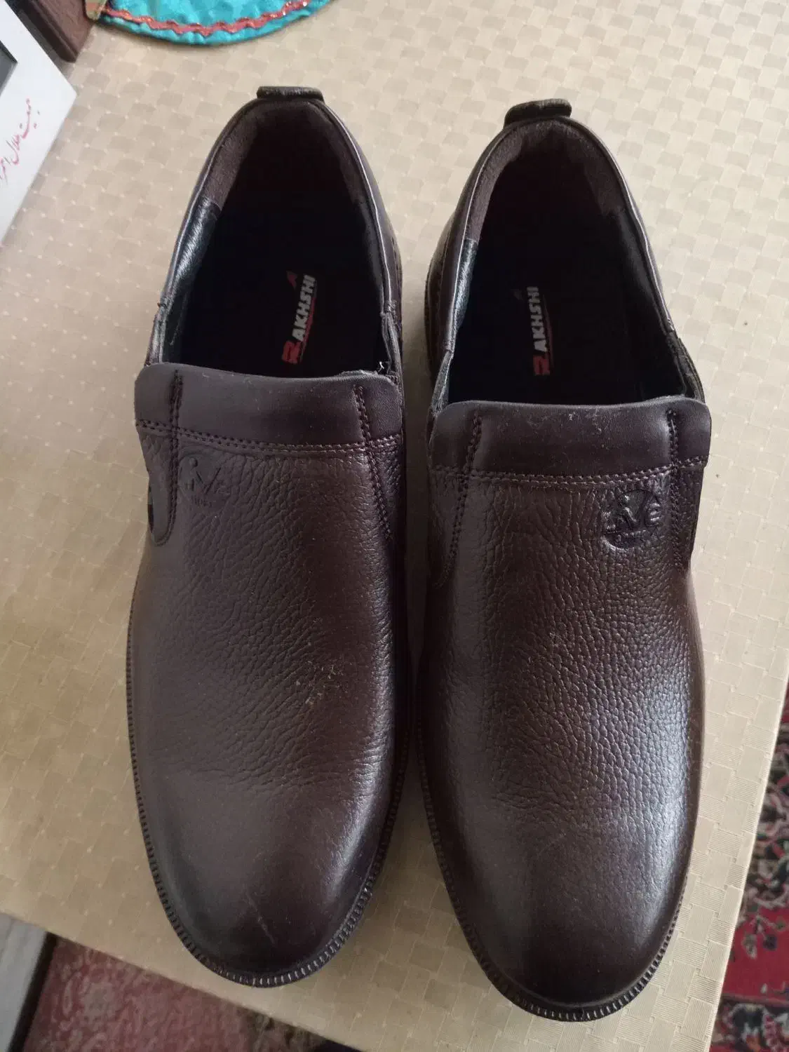 کفش|کیف، کفش، کمربند|قم, باجک دو|دیوار