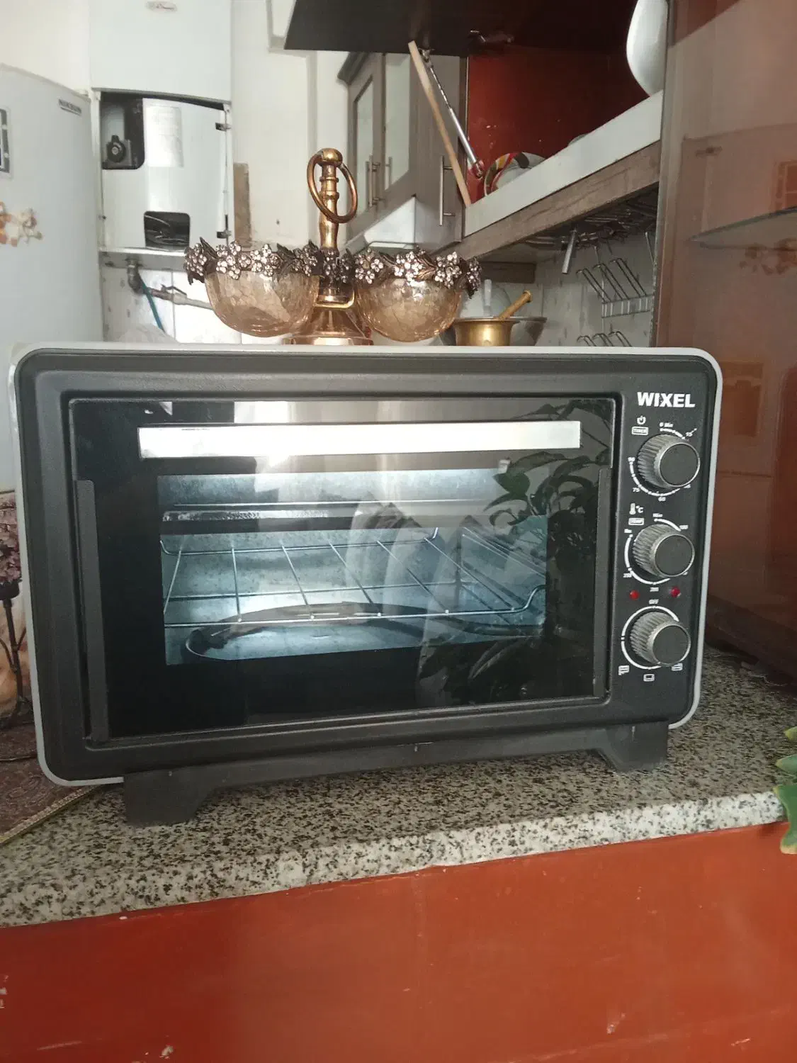 مایکروفر درحدنو استفاده نشده باظروف داخلش|اجاق گاز و لوازم برقی پخت‌وپز|چناران, |دیوار