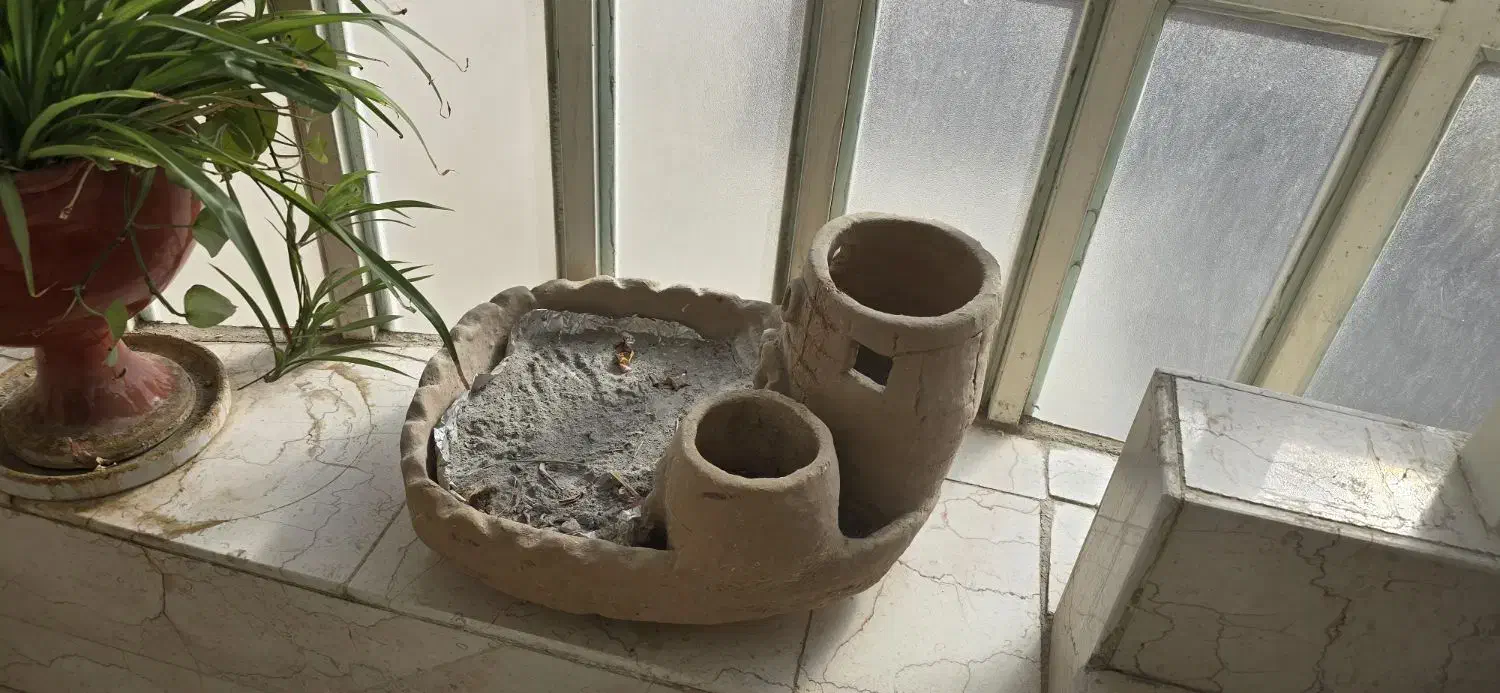 منقل گلی|ظروف پختوپز|خمینیشهر, |دیوار