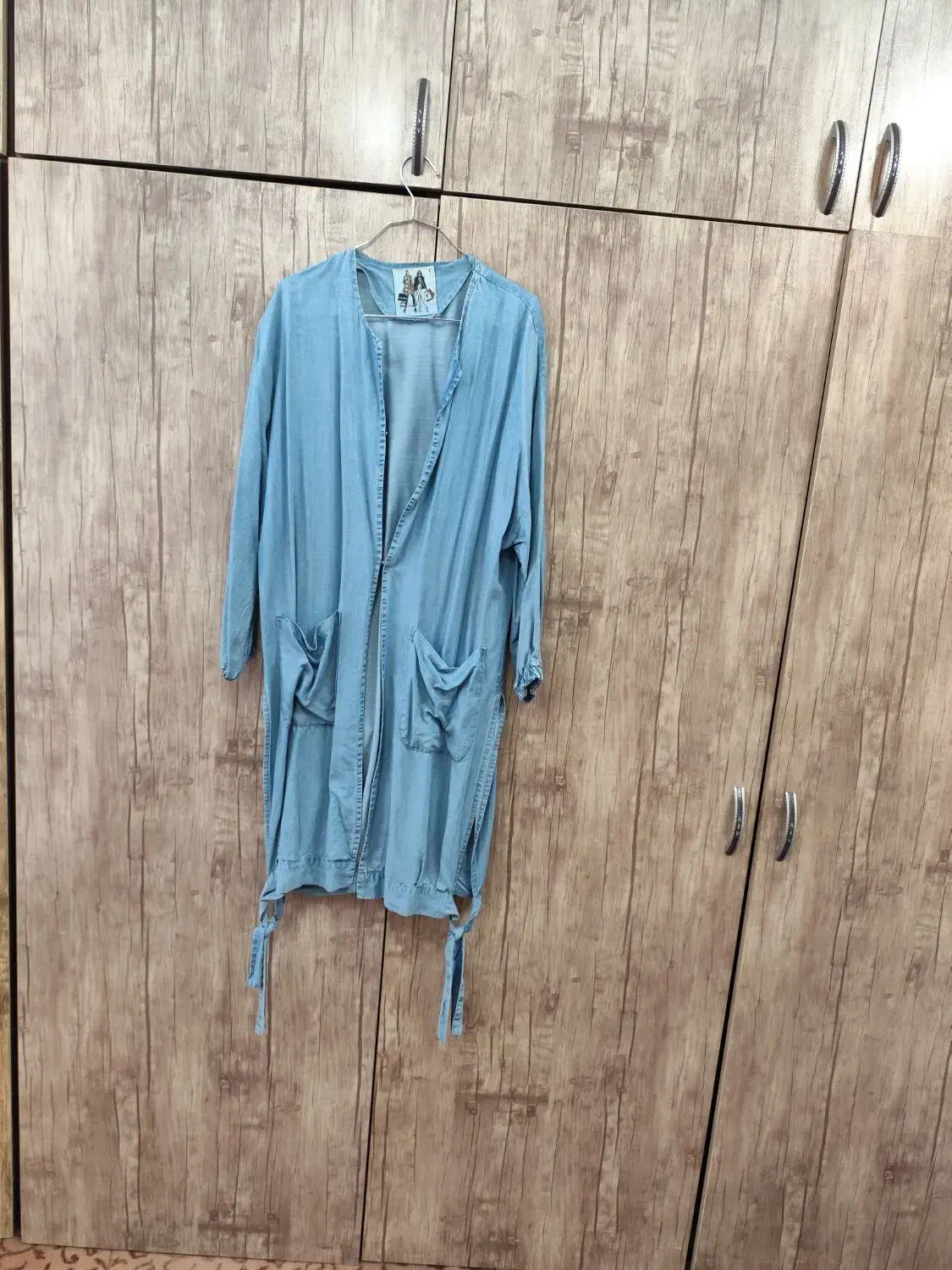 کلی لباس|لباس|مشهد, خواجه ربیع|دیوار