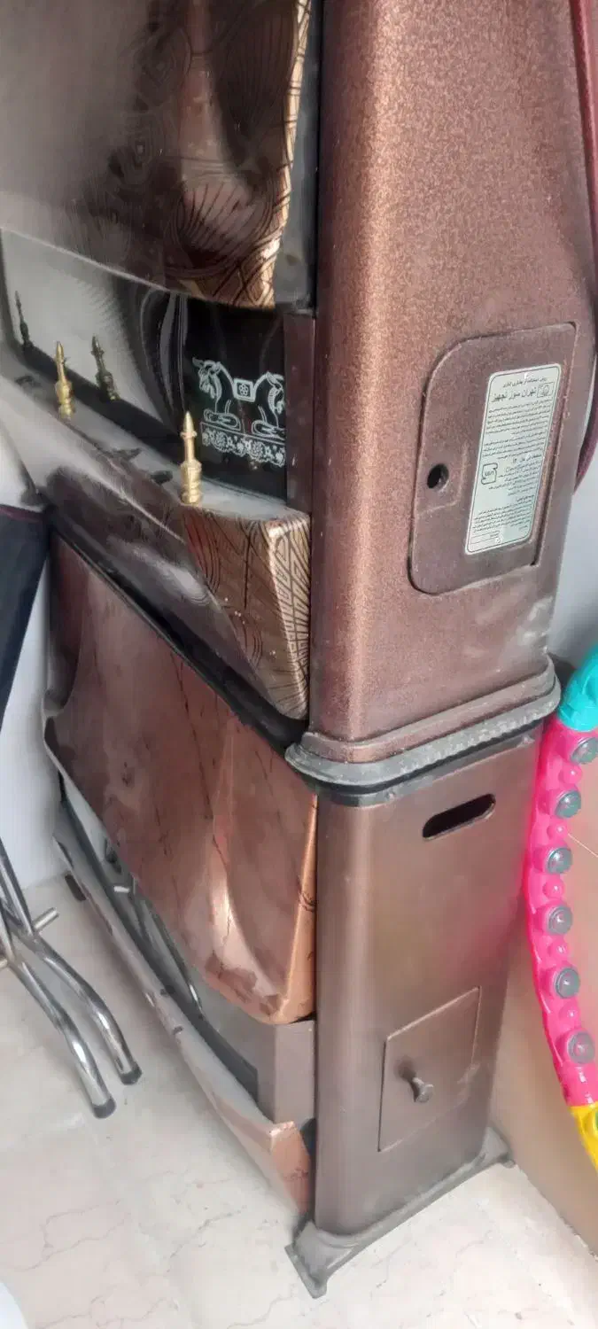 بخاری طرح شومینه ...جنس محکم و بادوام رنگ مسی|بخاری، هیتر، شومینه|زنجان, |دیوار