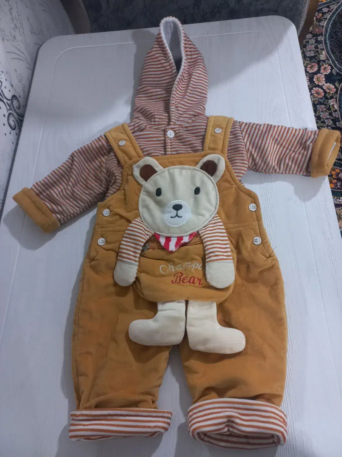 لباس بچه|کفش و لباس بچه|رشت, نخودچر|دیوار