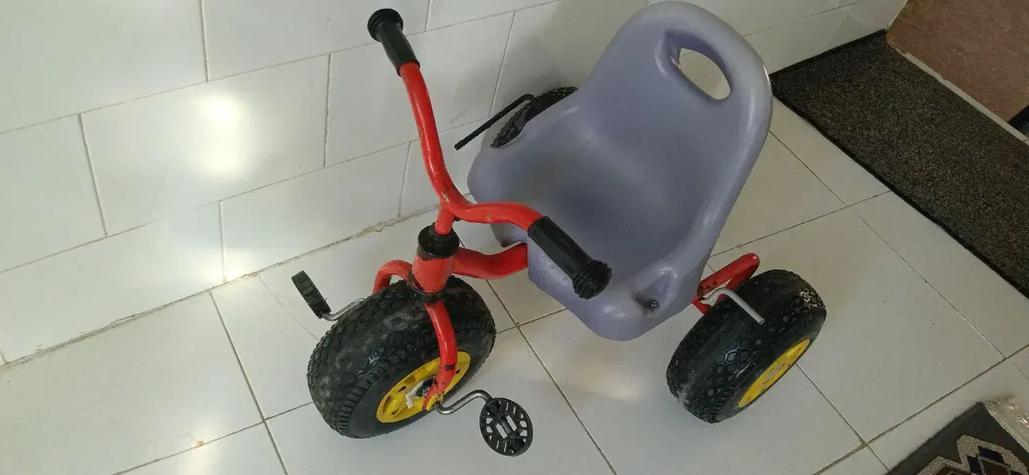 سه چرخه|اسباب‌بازی بچه|سرپل ذهاب, |دیوار