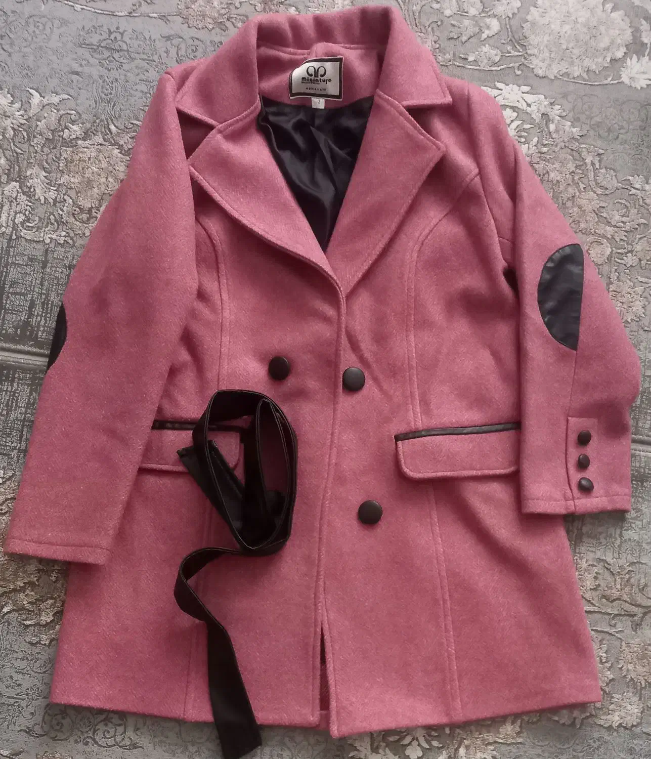 کاپشن|لباس|کرمانشاه, |دیوار