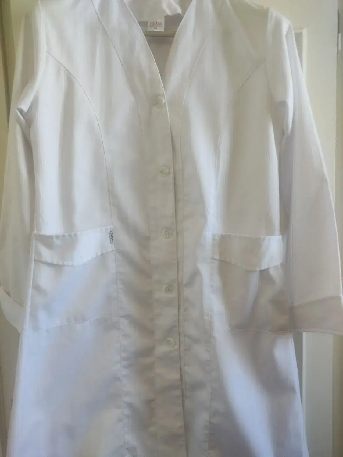 روپوش سفید|لباس|نیشابور, بنیاد شهید|دیوار