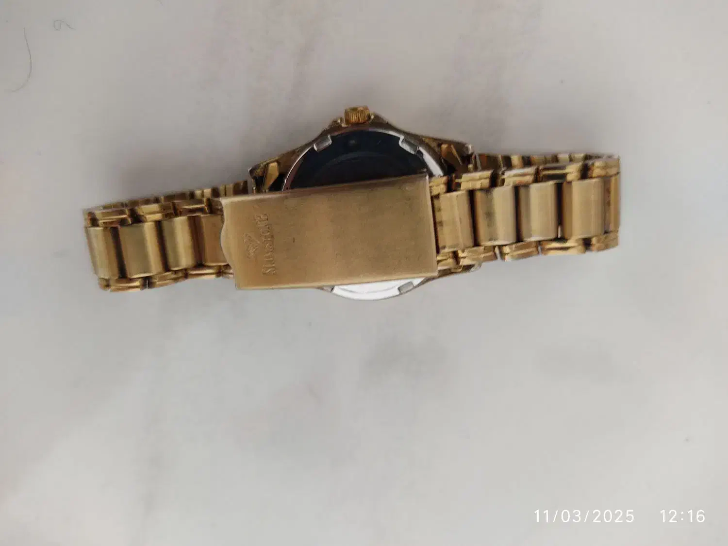 ساعت مچی|ساعت|سنقر, |دیوار