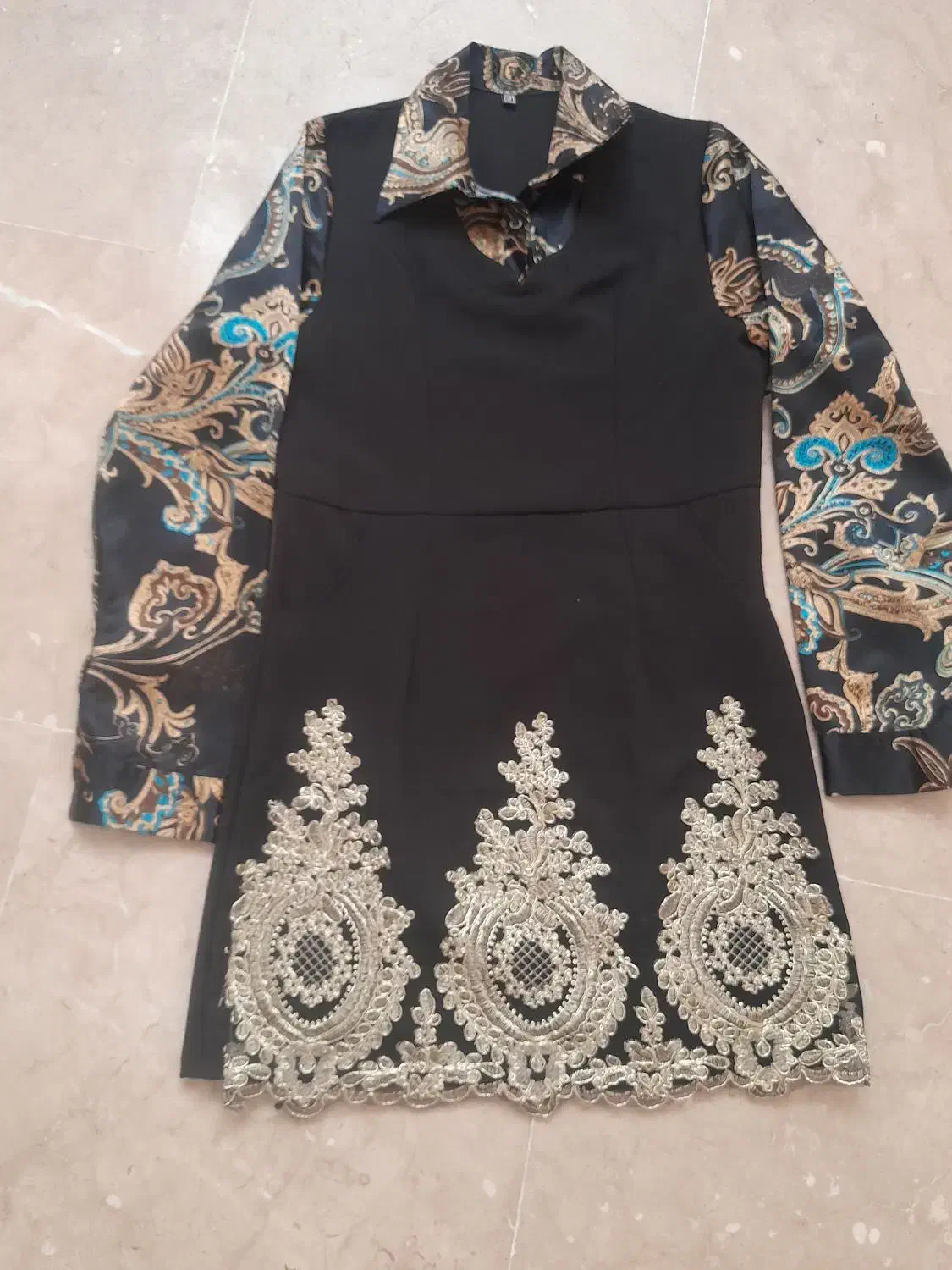 تعدادی لباس|لباس|تهران, قیام|دیوار